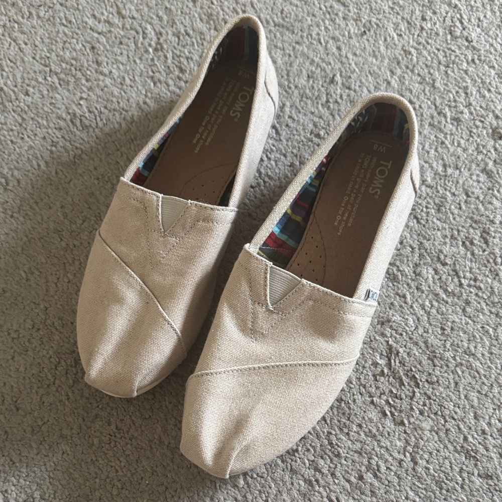 TOMS Classic Tan Canvas Slip-Ons